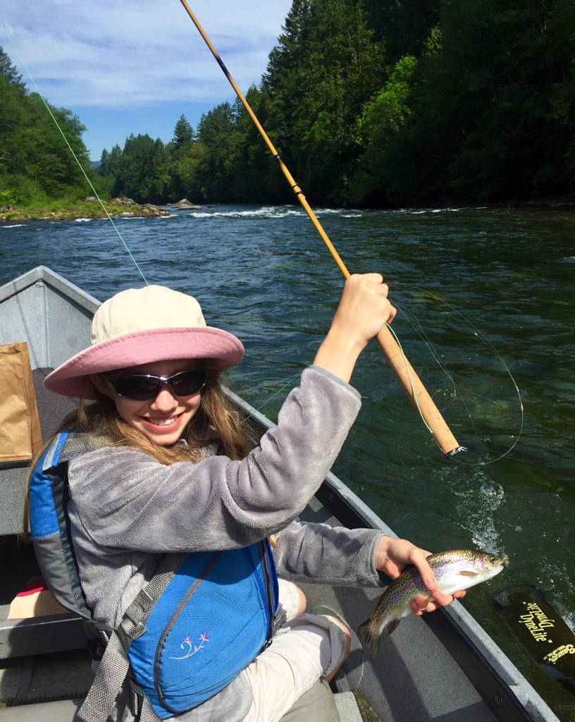 Young passenger on a McKenzie River drift boat tour